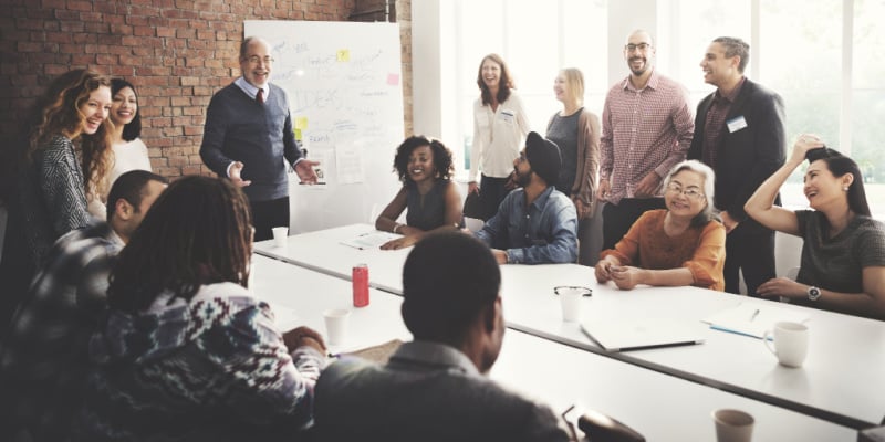 diverse group on people having a workplace discussion